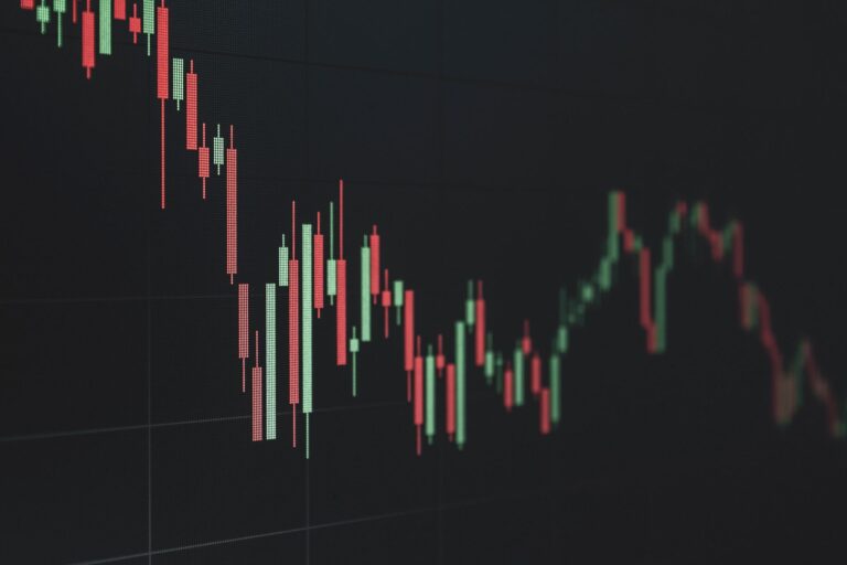 Stock market data chart showing trends in red and green. Perfect for financial and business themes.