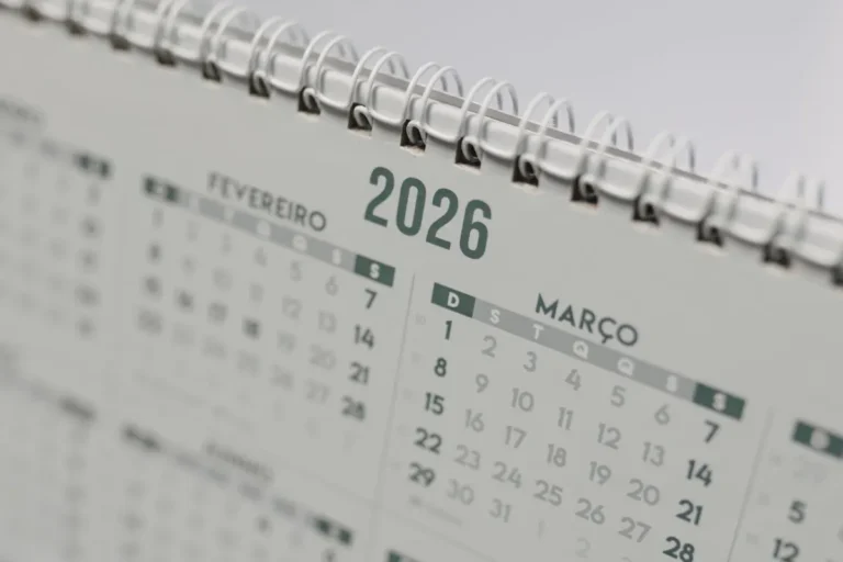 Close-up view of a 2026 spiral-bound desk calendar showing February and March.